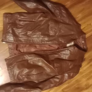A brown leather coat size 42 in woman's Berman's